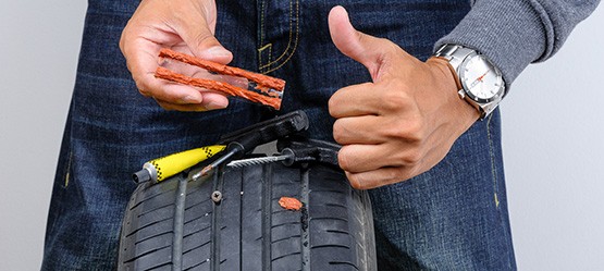 arreglar pinchazo de un neumático en carretera